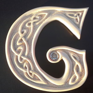 Hand carved Celtic G